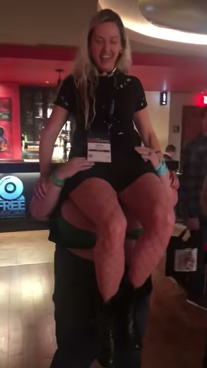 Lexxxi Luxe pornstar Las Vegas AVN expo..gives girl a ride on her boobs