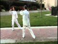 Two people mirror tai chi form 8