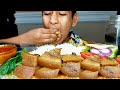 Kid eating yummy pork curry with basmti rice and  boil mustard leaf  salad  hungry gadwali