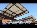 Arizona expands utility aid as Phoenix opens solar-powered senior housing community