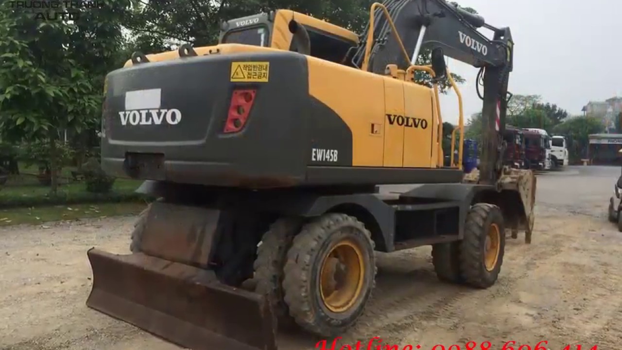 Máy xúc đào bánh lốp Volvo EW145B - 0979 768 377 - TRƯỜNG THÀNH AUTO - YouTube