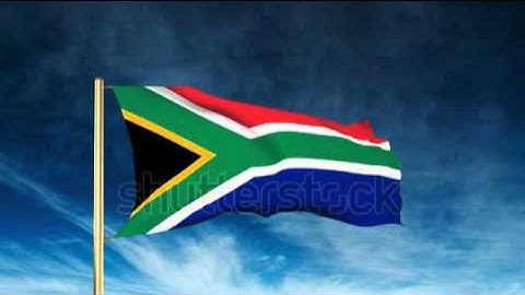South Africa flag slider style. Waving in the wind with cloud background animation Stock video by