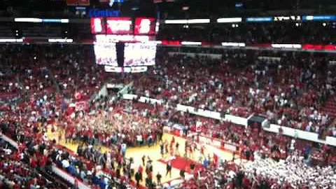 NC State fans rush the court