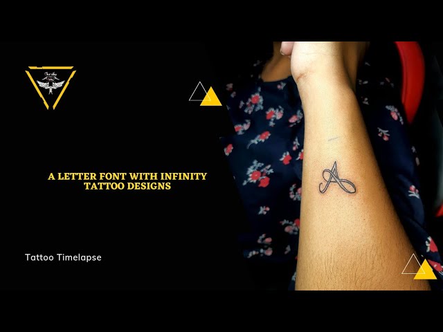 Infinity symbol tattoo Black and White Stock Photos & Images - Alamy