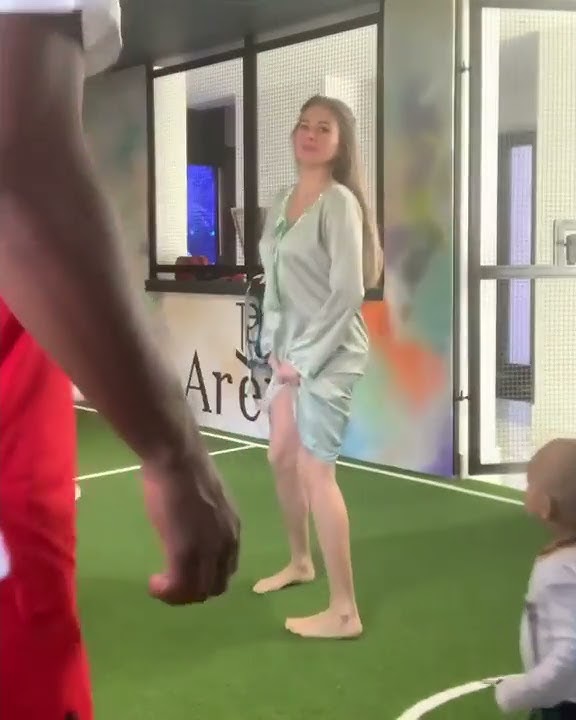 Pogba and his wife playing with their son