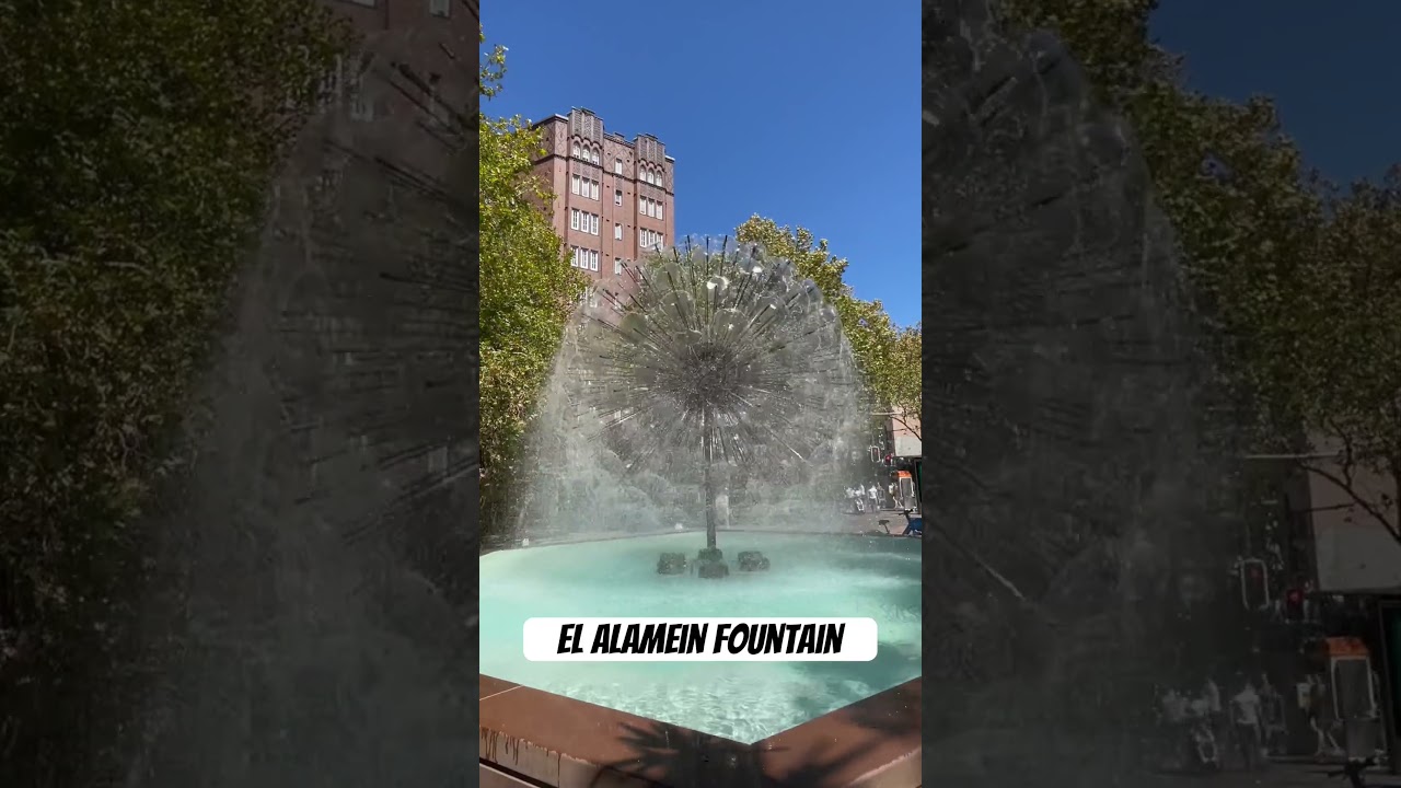 The iconic El Alamein fountain with Elizabeth Bay architecture in background 