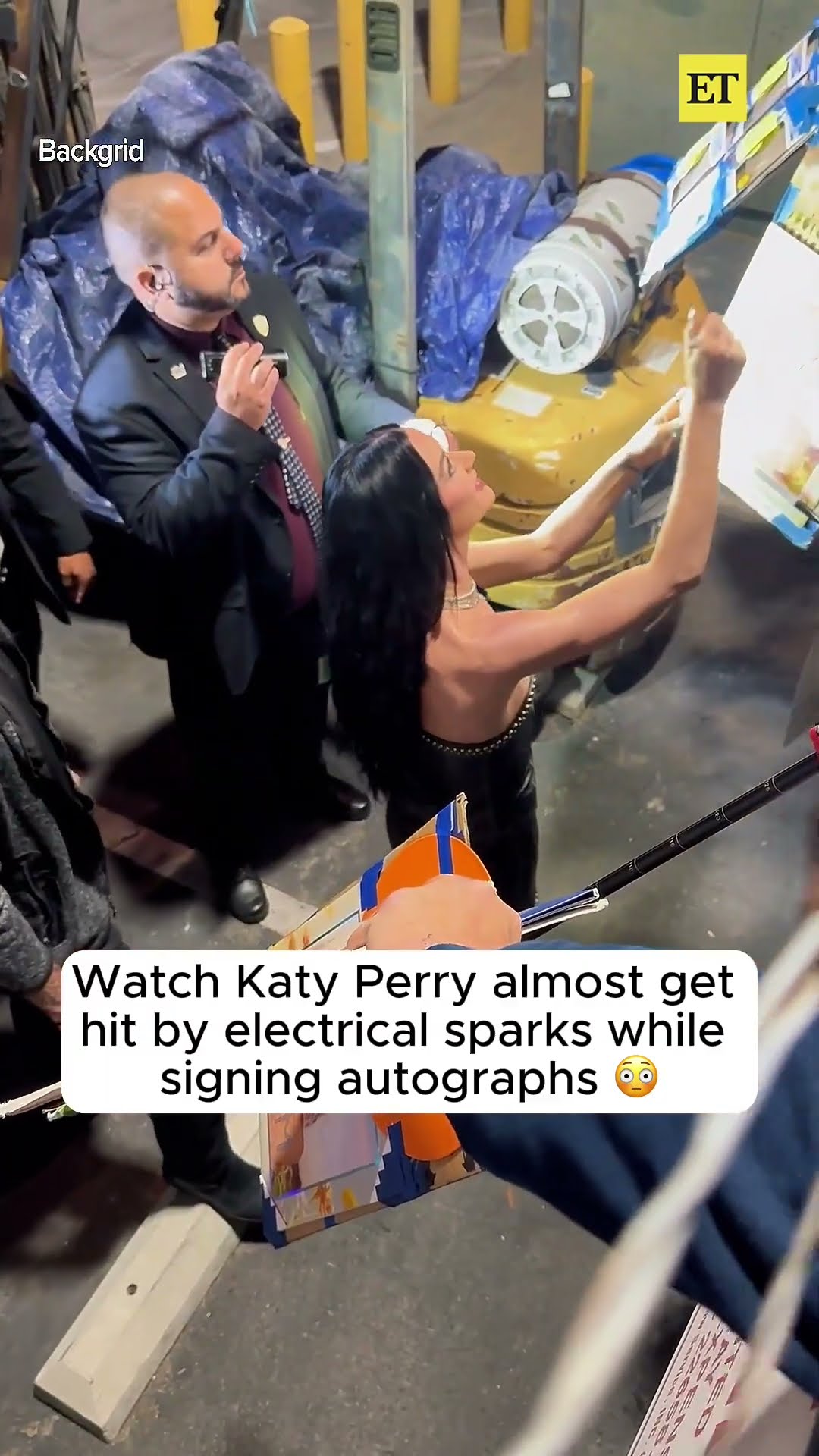Watch Katy Perry Almost Get Hit By Electrical Sparks While Signing Autographs #katyperry #shorts
