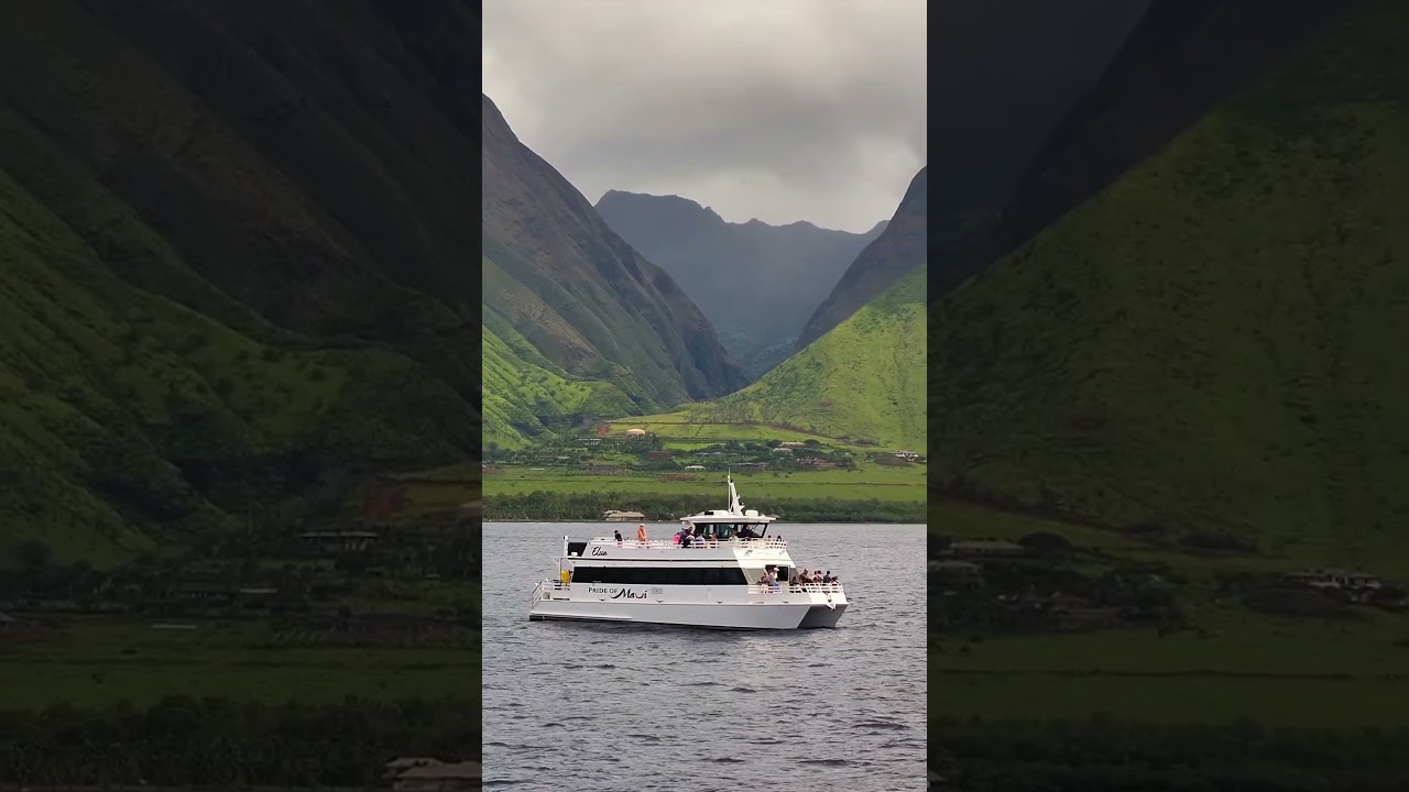Cruising aboard the 'Elua with a view of the West Maui Mountains