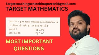 half of 1 per cent, written as a decimal, is.[Target Mathematics]