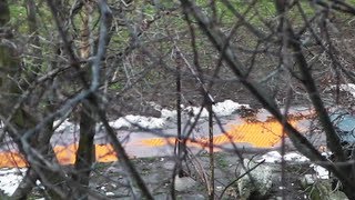 Optical Illusion: Orange Acid On The Sidewalk