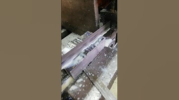 CUTTING MACRO-ETCH SPECIMEN ON BAND SAW IN MECHANICAL WORKSHOP PRIOR ETCHING