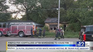 Firefighter injured while responding to Jackson house fire