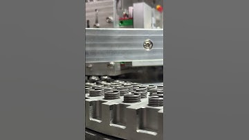 Automatic feeding of spring grinding machine #springformingmachinemanufacturer #spring #factory