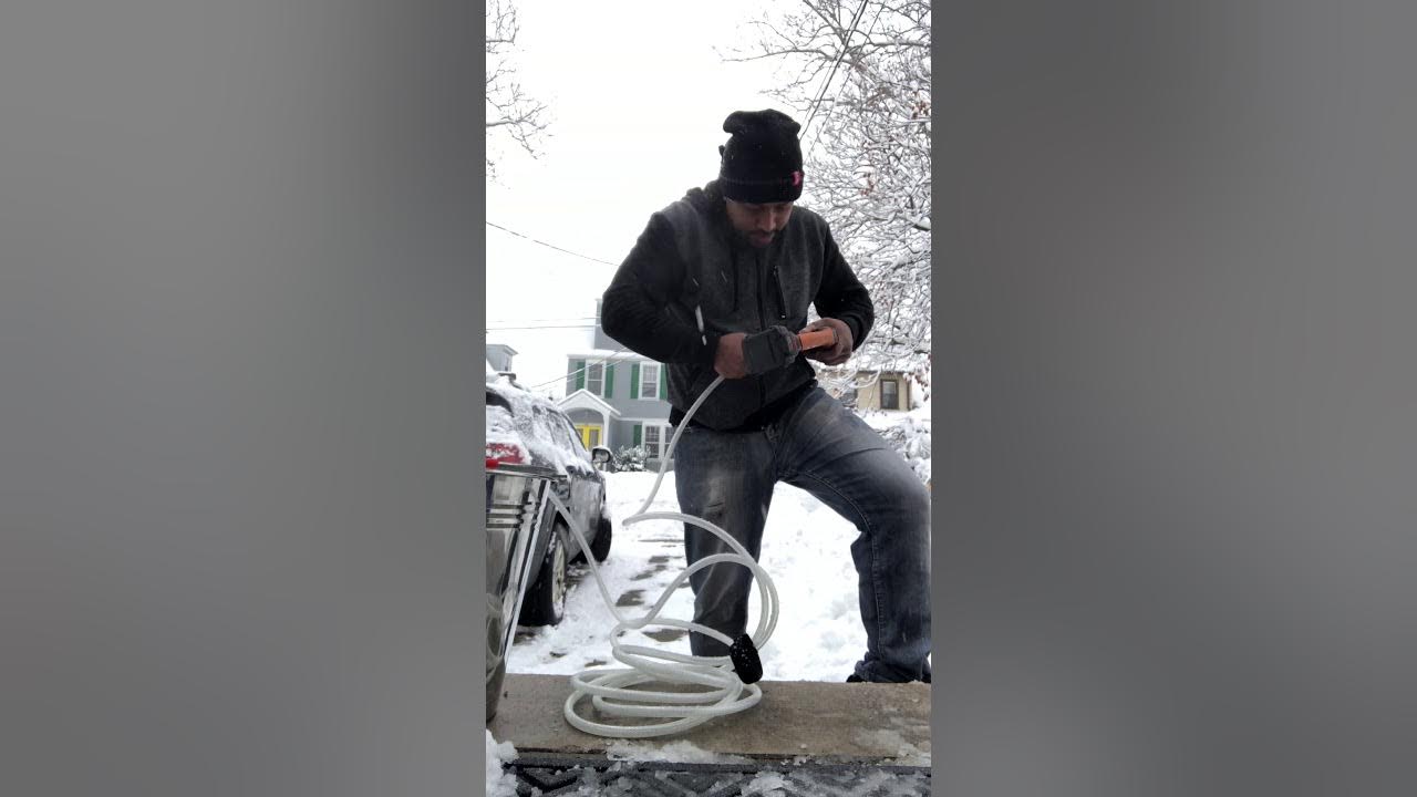 Melting Snow with a bucket of hot water dishwashing soap and rubbing