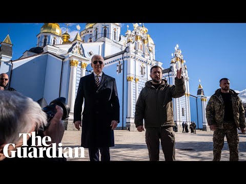 Biden and Zelenskiy walk in Kyiv as air raid sirens blare