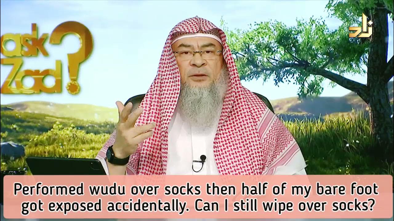 Wiped over socks during wudu, half of my foot got exposed, Can I still