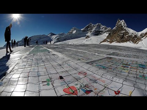 Climate change: giant postcard aims to highlight Europe’s shrinking glaciers