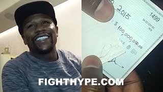 FLOYD MAYWEATHER SHOWS OFF $100 MILLION CHECK; STUNTS ON HATERS, LAUGHS AT TAX STORIES, BUYS 2 CARS