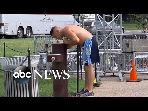 Heat wave continues to envelop half of US after storms hit Northeast