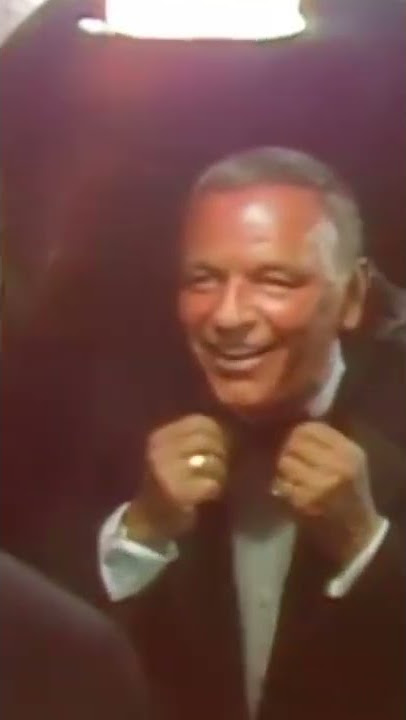 Frank Sinatra taking a couple last glances in the mirror before hitting the stage 🎤👔