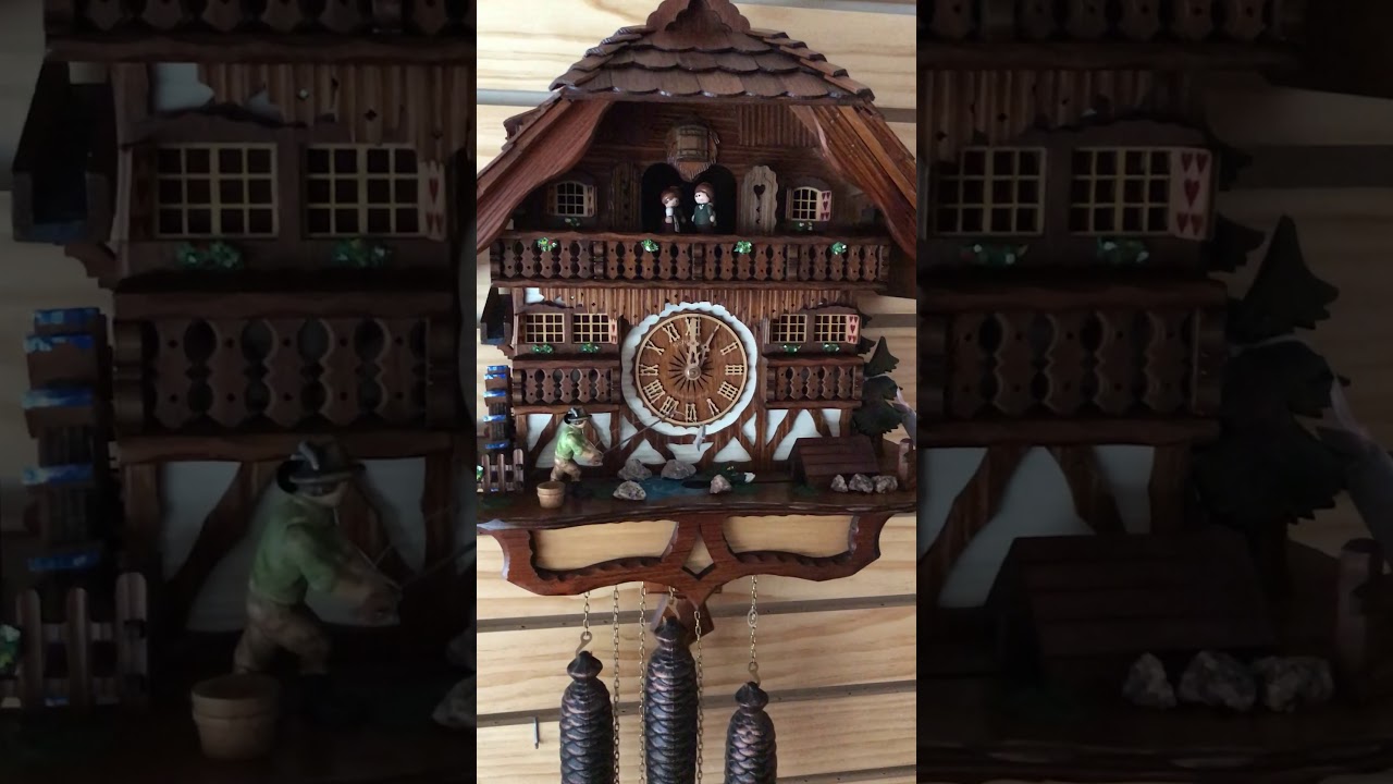Schneider chalet cuckoo clock with angler and ducklings | 