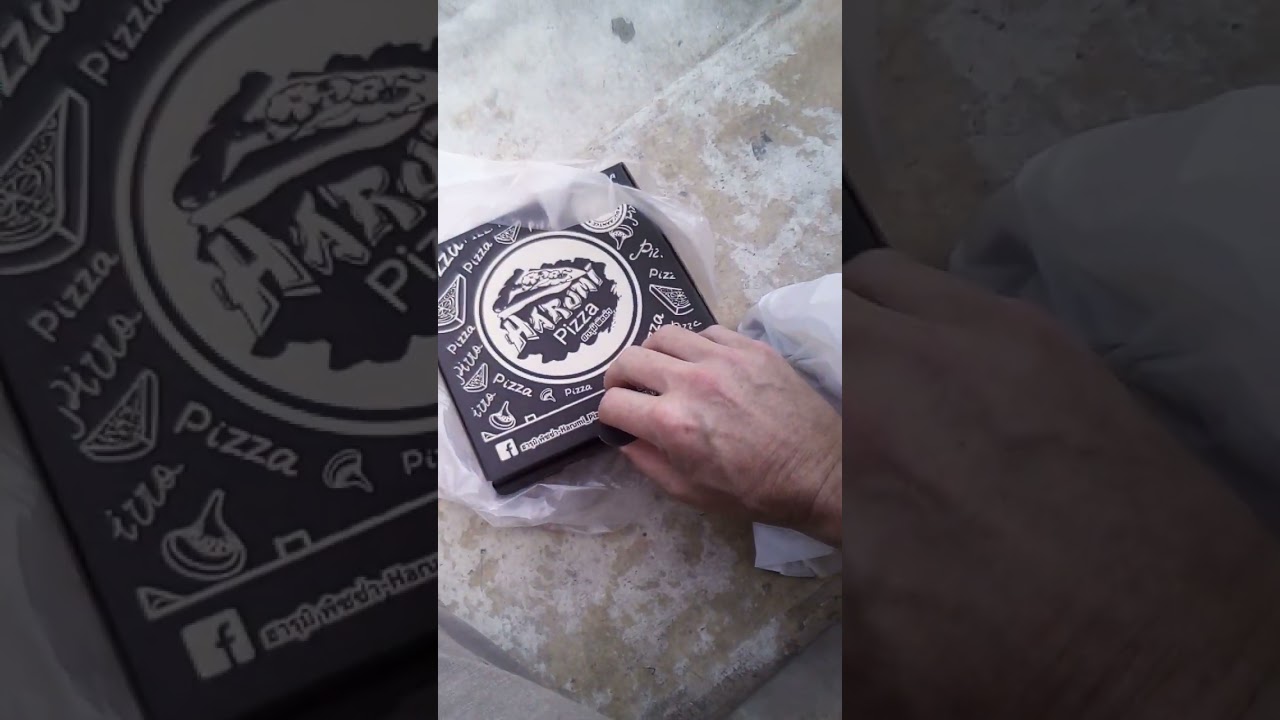 eating pizza on the curb 