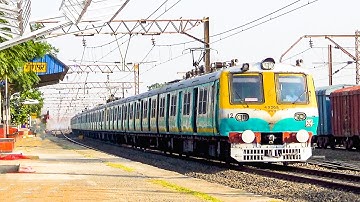 Special Livery Sea Green EMU made parallel run with Freight train hauling WAG9 & exit through curve
