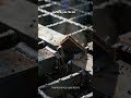 Real Shot of Steel Grating Press Processing Industrial Metal Mesh