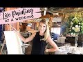 Live wedding painting the life of an artist