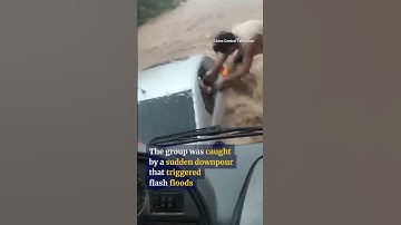 Civilians rescue 3 people trapped in car during flash flood