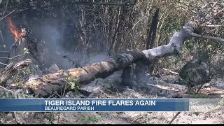 Tiger Island Fire contained after flaring up again