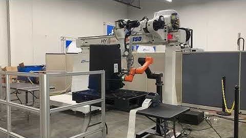 HCR-5 Labeling Automation with H5 5 Axis Robot