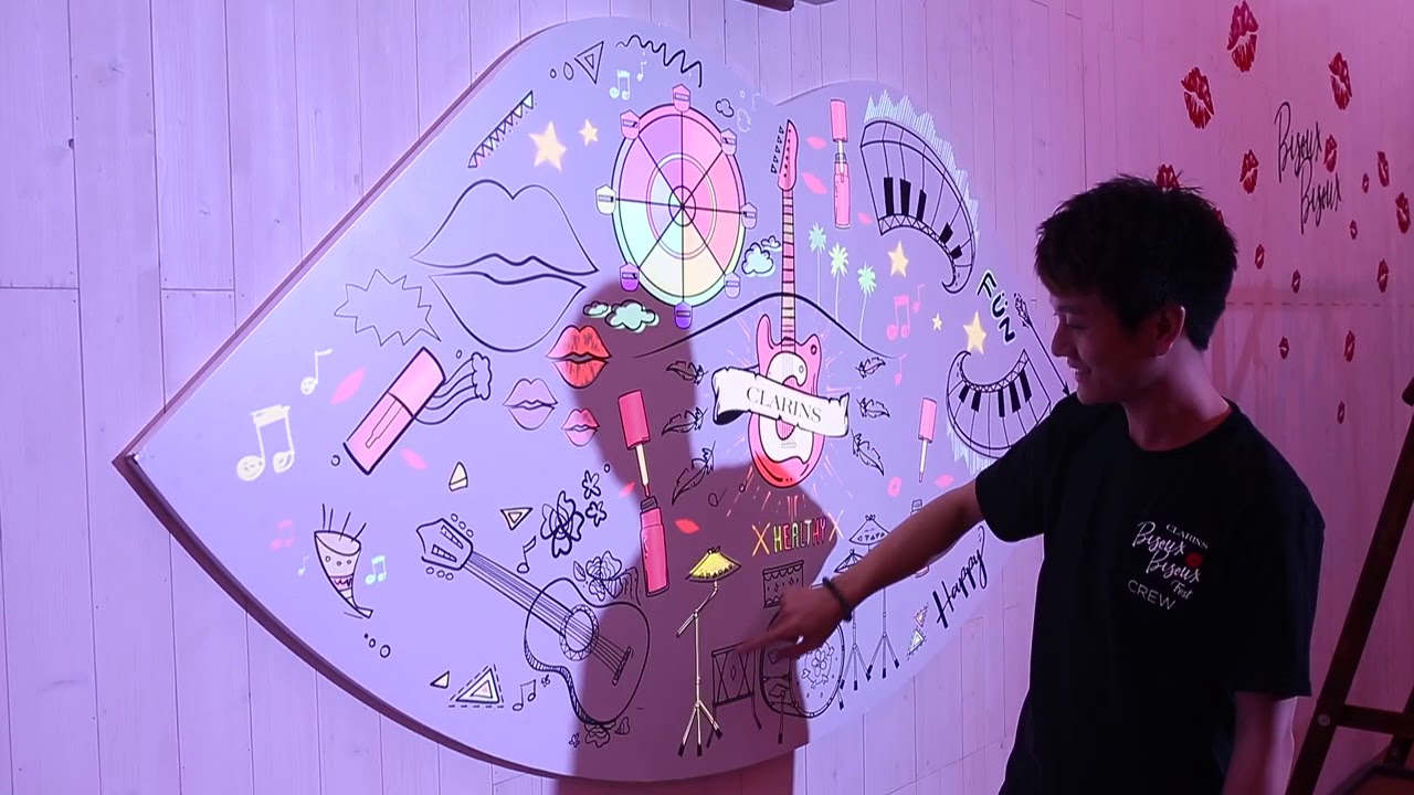 Interactive music playing wall - YouTube