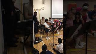 Over the Rainbow played by Maika at a school assembly