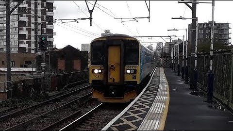 Class 153 passing Limehouse