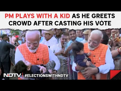 PM Modi In Ahmedabad | PM Modi Plays With A Kid As He Greets Crowd After Casting His Vote @NDTV