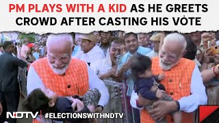 PM Modi In Ahmedabad | PM Modi Plays With A Kid As He Greets Crowd After Casting His Vote