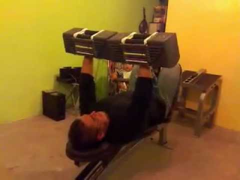 Bench press with powerblock dumbells 90 lb each hand 