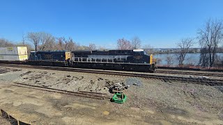 CSX New York Central heritage locomotive 1853 leads train M415 at Long Bridge 
