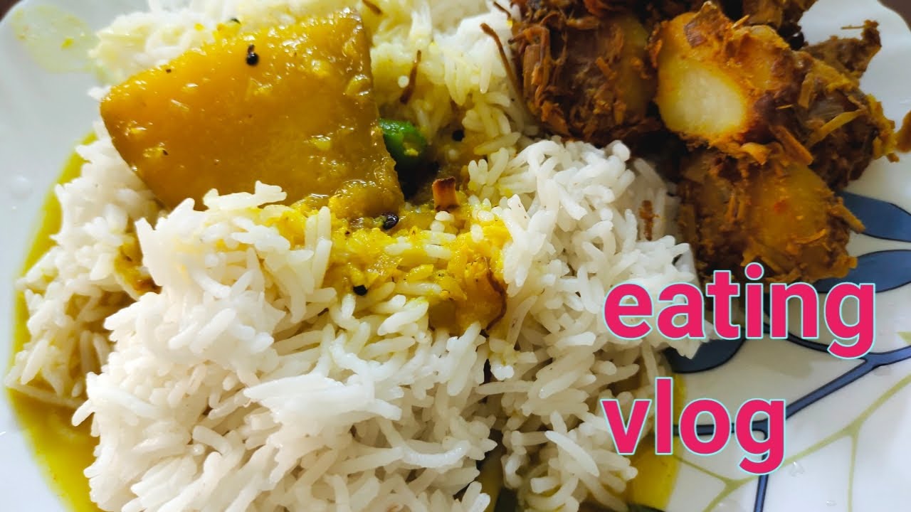 Eating Lunch Hot Rice With Tak Dal And Banana flower Sabji Indian