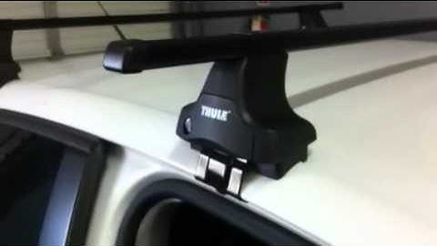 Volkswagen Jetta Sedan with Thule Traverse Roof Rack by Rack Attack