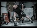 Advanced kettlebell complex for core and upper body strength.