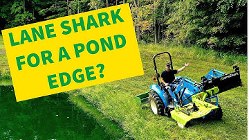 LANE SHARK Mowing A POND EDGE?- A front mounted Rotary Cutter on a Tractor.
