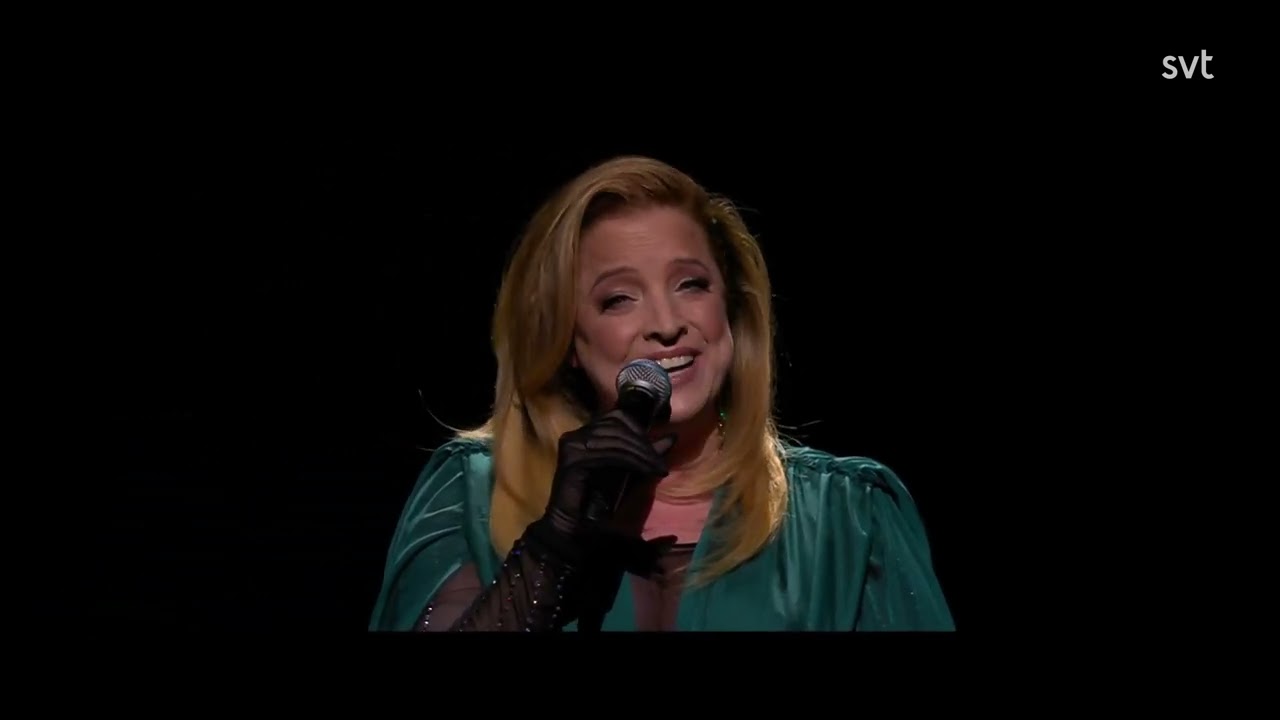 Se Shirley Clamp framföra Let There Be Angels inför Mello