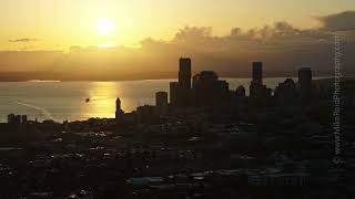 Seattle Skyline at Sunset as Ferry Enters Elliott Bay | Golden Hour Aerial