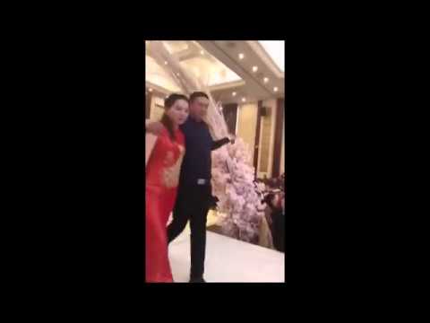 Father of groom gets drunk at wedding, forces bride to kiss him on stage