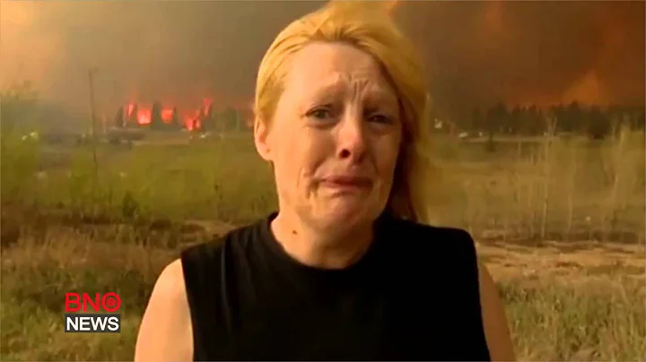 Wildfire destroys homes in Canadian city; 80,000 ordered evacuated