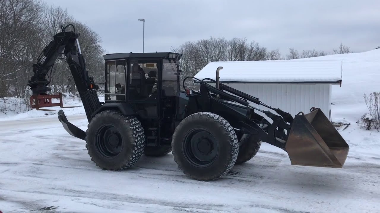 Köp Traktorgrävare Huddig 960 C6 med tiltrotator och redskap på Klaravik