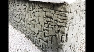Vertical stamped concrete House Foundation Renovation with silicone stamps | stone pattern