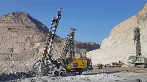 SmartROC D65 mk2 drilling production hole in open pit mine